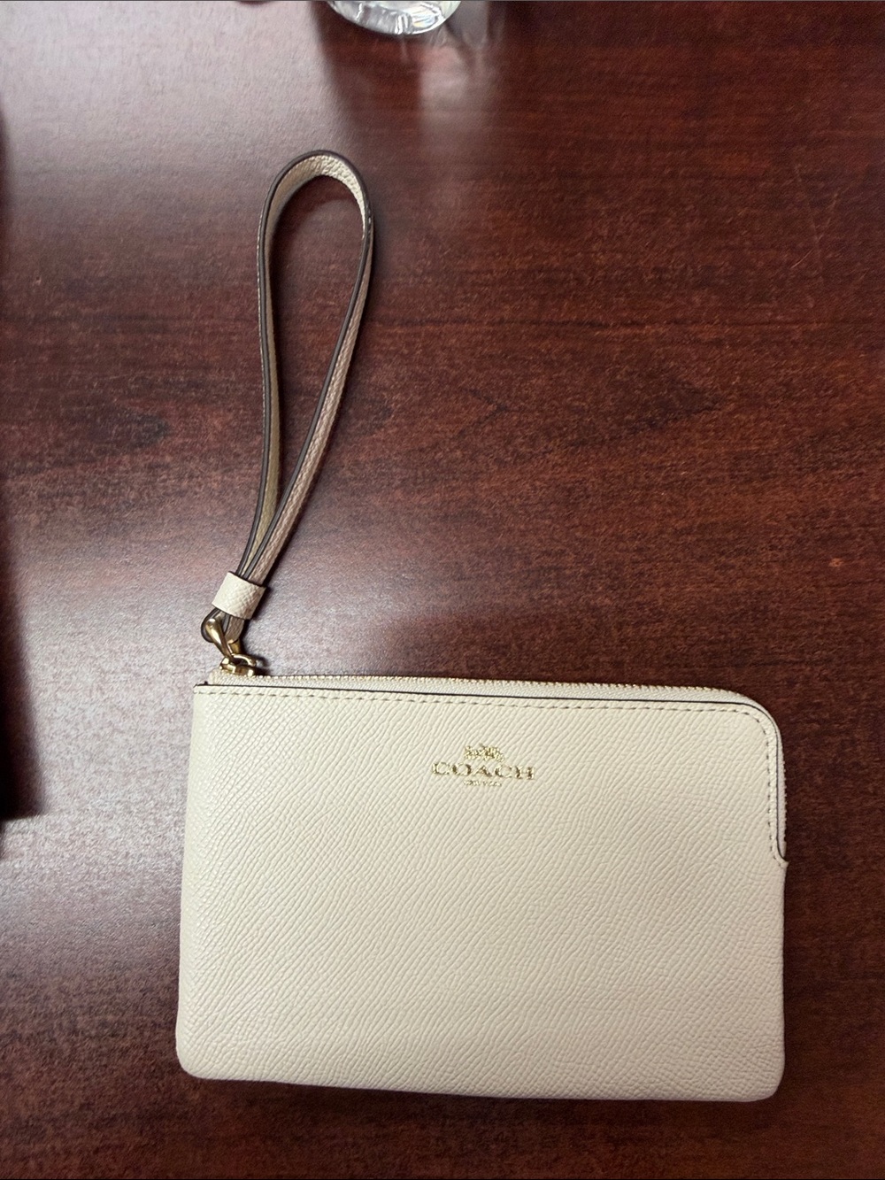 Coach Cream Pebbled Leather Wristlet with Gold Logo